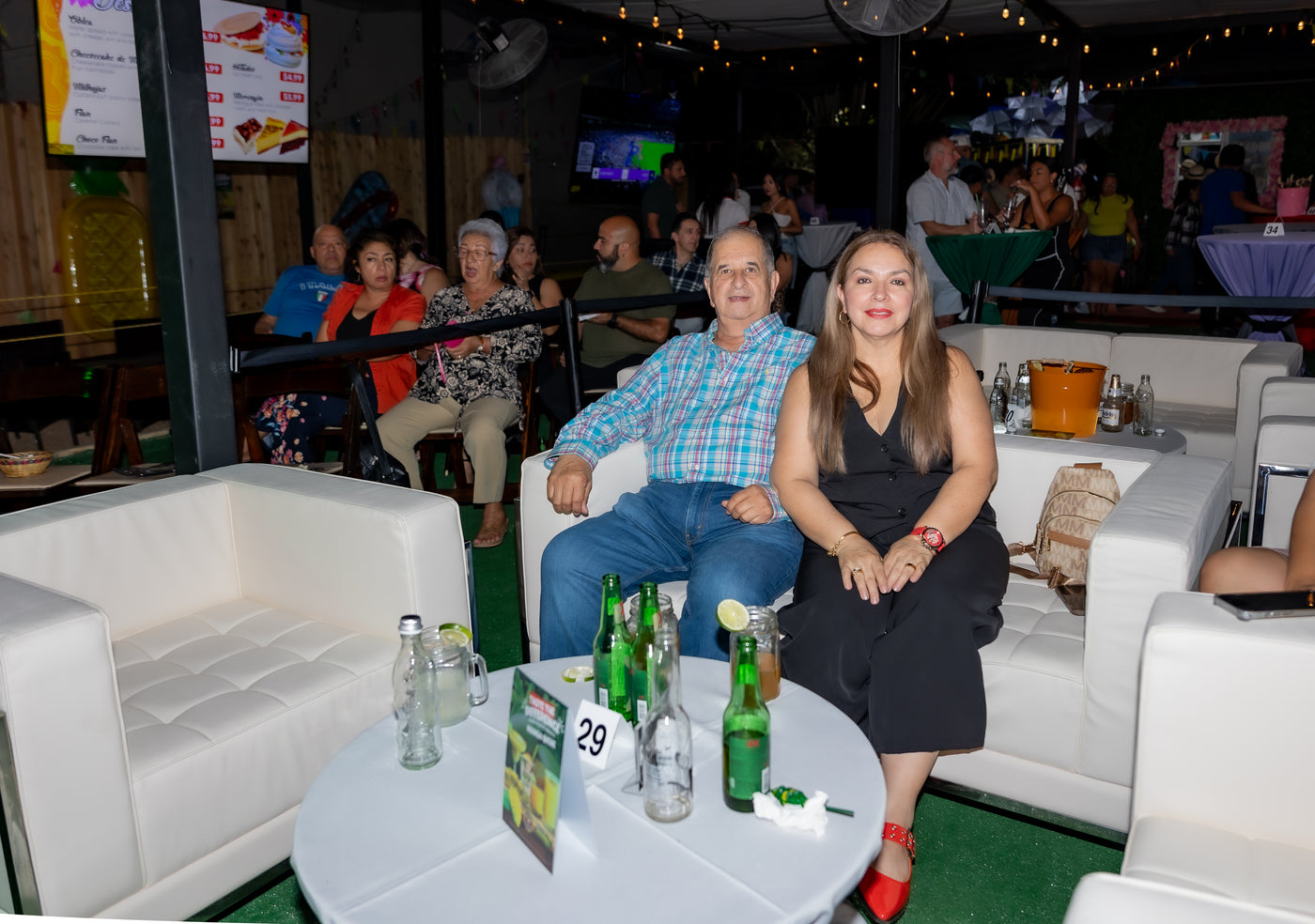 Couple sharing drinks at the bar